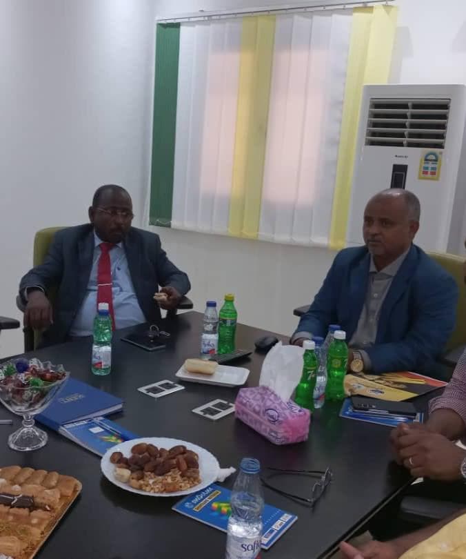 Partners and directors posing for a photo.